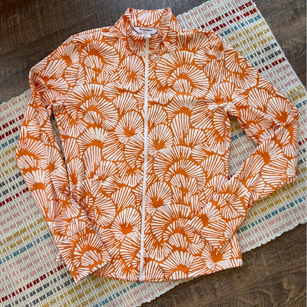 Tommy Bahama Golf Zip Up Performance Jacket. Poppy Pattern in White Orange